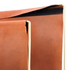 QUVIO Tijdschriftenrek Van Metaal En Leer - Bruin Met Goud -Meubels Voor Thuis 10375204