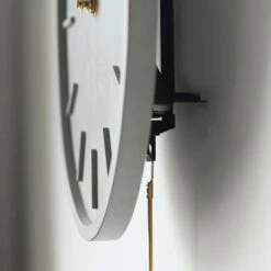 QUVIO Wandklok Beton Klassiek Met Slinger - Grijs -Meubels Voor Thuis 9582043